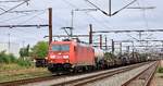 DBCAC 185 330-5 mit Mischer im Bhf Pattburg wartet auf Ausfahrt. 07.08.2026