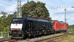 DB Cargo AG, Mainz [D] mit ihrer   189 091-2  [NVR-Nummer: 91 80 6189 091-2 D-DB] mit  185 307-6  [NVR-Nummer: 91 80 6185 307-6 D-DB] am Haken am 14.10.26 H�he Bahnhof Magdeburg Neustadt.