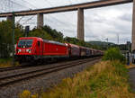 Vermutlich mit dem Ziel Kreuztal, f�hrt am 22 Juli 2026 die 187 128 (91 80 6187 128-4 D-DB) der DB Cargo AG mit einem Coilzug durch Siegen-Eiserfeld in Richtung Siegen. Im Hintergrund die 105 m hohe Siegtalbr�cke der Autobahn A45 (Sauerlandlinie).
 ...