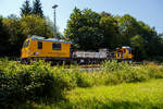 Das Gleisarbeitsfahrzeug „Hummel“ 746 014 (99 80 9110 014-4 D-DBMP), ein Plasser & Theurer GAF auf der MISS-Plattform, der DB InfraGO Netz Instandhaltung, ex DB Netz AG war am 19 Juni 2026 im Bahnhof Herdorf im Einsatz. Hier wurden die Fl ...