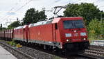 DB Cargo AG, Mainz [D] mit der Doppeltraktion '185 297-9' [NVR-Nummer: 91 80 6185 297-9 D-DB] + '185 254-0' [NVR-Nummer: 91 80 6185 254-0 D-DB] und dem Erzzug aus Hamburg Richtung Ziltendorf Eko am 08.06.26 H�he Bahnhof Saarmund.