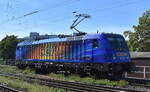 WLC - Wiener Lokalbahnen Cargo GmbH, Wien [A] mit der farblich toll gestalteten '187 323' [NVR-Nummer: 91 80 6187 323-1 D-WLC] am 12.08.26 H�he Bahnhof Magdeburg-Neustadt.