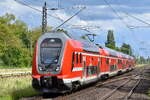 DB Regio AG - Region Nordost, Fahrzeugnutzer: Regionalbereich Mecklenburg-Vorpommern, Schwerin mit ihrem Twindexx Vario '445 003' (NVR: '91 80 0445 003-0 D-DB....') als RE5 nach Rostock Hbf. am 11.06.26 Einfahrt Bahnhof Berlin Hohensch�nhausen (baust ...