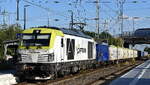 ITL - Eisenbahngesellschaft mbH, Dresden [D]  mit ihrer Vectron Dual Lok  248 010-1  [NVR-Nummer: 90 80 2248 010-1 D-ITL] und einem Ganzzug Hochbordwagen mit Kalk/Kies??? am 24.06.26 Durchfahrt