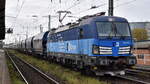 ČD Cargo a.s., Praha [CZ] mit ihrer Vectron '383 012-2' [NVR-Nummer: 91 54 7383 012-2 CZ-CDC] und einem Getreidezug am 29.10.26 H�he Bahnhof Magdeburg Neustadt.