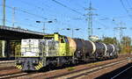 RBB - Regiobahn Bitterfeld Berlin GmbH, Bitterfeld [D] mit ihrer MaK G 1206 Lok   1022  [NVR-Nummer: 92 80 1275 801-9 D-RBB] und vier Kesselwagen am 19.10.26 H�he Bahnhof Sch�nefeld b.