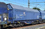 Drehgestell-Flachwagen mit vier Rads�tzen, verschiebbarer Teleskophaube und Lademulden f�r Coiltransporte vom Einsteller AXBENET s.ro.