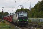 TXLog 193 754 zieht ein Ganzzug mit Landrovers durch Viersen nach Viersen-Helenabrunn am 23 Augustus 2026.