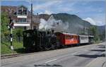 Die BFD HG 3/4 N� 3 der Blonay Chamby Bahn erreicht mit ihrem Dampfzug von Chaulin den Bahnhof von Blonay und passieert das Ausfahrsignal, eine Hippsche Wendescheibe.