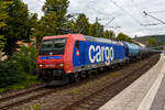 Die an die SBB Cargo International AG Re 482 026-2 (91 85 4482 026-2 CH-NRFAB) „Gotthardo 2016“ der Nordic Re-Finance AB f�hrt am 25 August 2026 mit einem Kesselwagenzug durch den Bahnhof