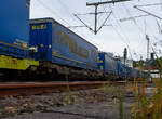 Sechsachsiger Gelenk-Taschenwagen (Doppeltaschenwagen Typ T3000e in Gelenkbauart) der Gattung Sdggmrss, 33 85 4992 369-0 CH-WASCO, der WASCOSA AG (Luzern), am 06 Juni 2026 im Zugverband bei der